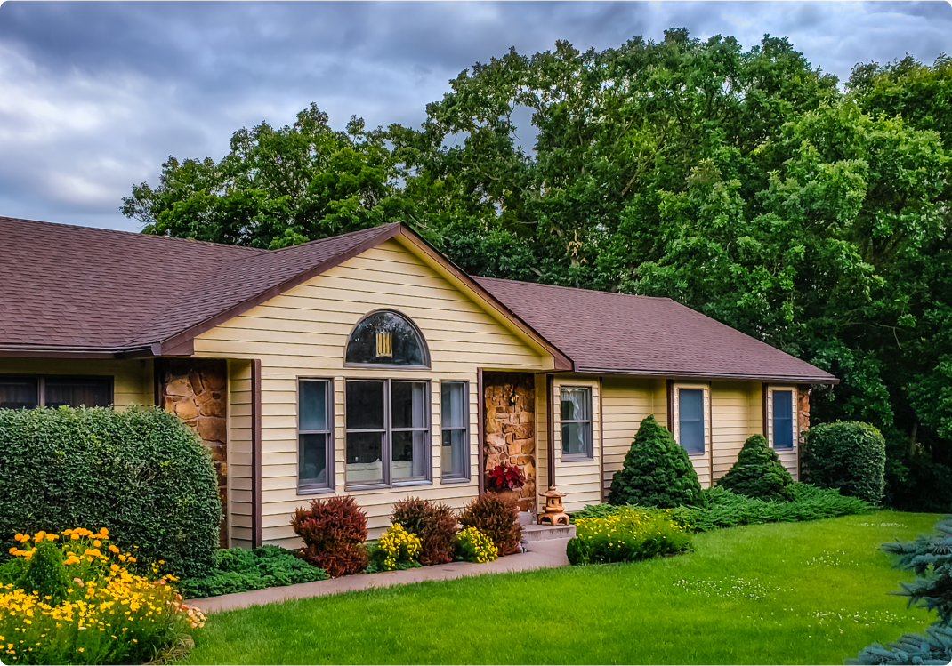 home with lush greenery